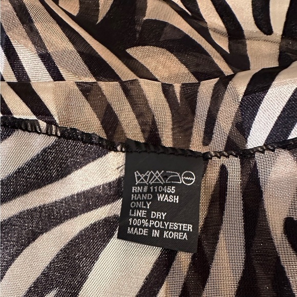 ZEBRA PRINT, NWOT, WOMENS SCARF. 100% POLYESTER. 13 1/4”W X 59”L - Picture 5 of 5